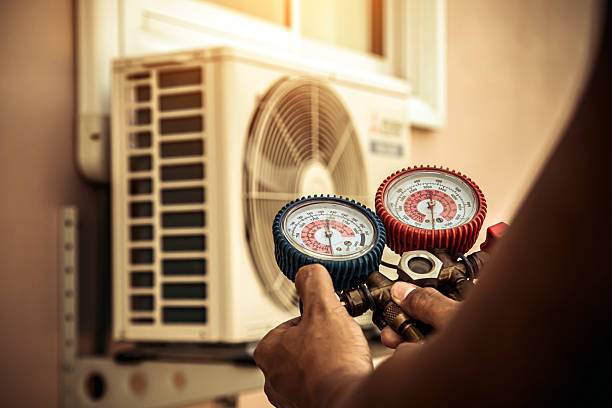 Professional Heat Pump Repair technician working in Madison, OH